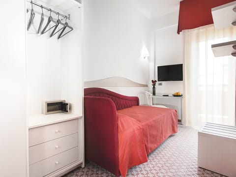 Quadruple Room, Balcony | Minibar, in-room safe, desk, free WiFi