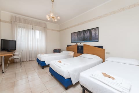 Desk, free WiFi, bed sheets