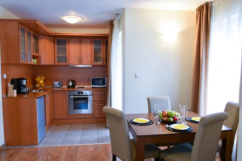 Apartment, 1 Bedroom | Private kitchen | Fridge, microwave, oven, stovetop