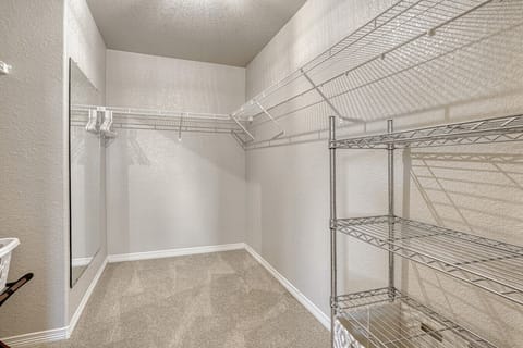 Upper level master bath with walk-in closet