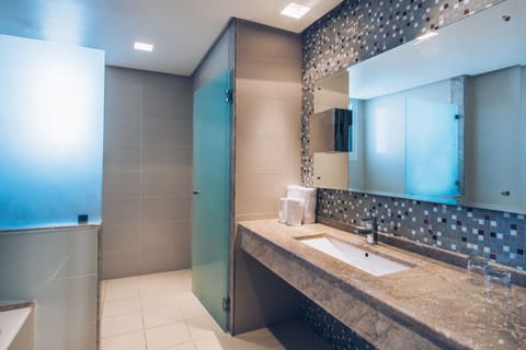 Superior Suite | Bathroom | Bathtub, deep soaking tub, eco-friendly toiletries, towels