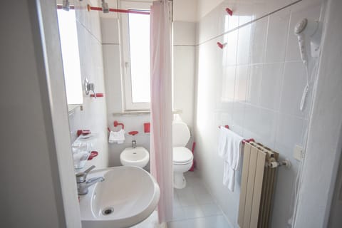 Shower, deep soaking tub, free toiletries, hair dryer