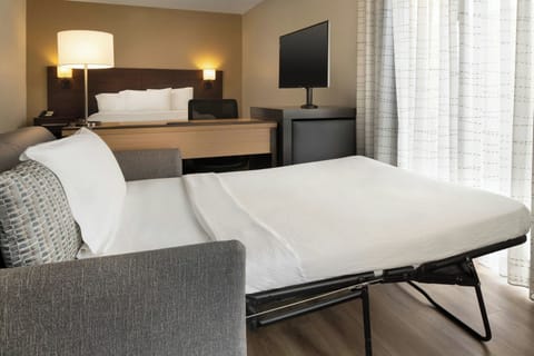 Premium bedding, individually furnished, desk, laptop workspace