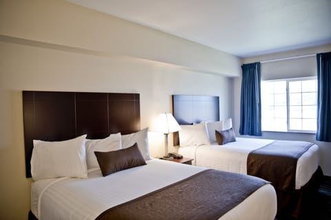 Family Suite, Multiple Beds, Non Smoking | In-room safe, desk, laptop workspace, blackout drapes