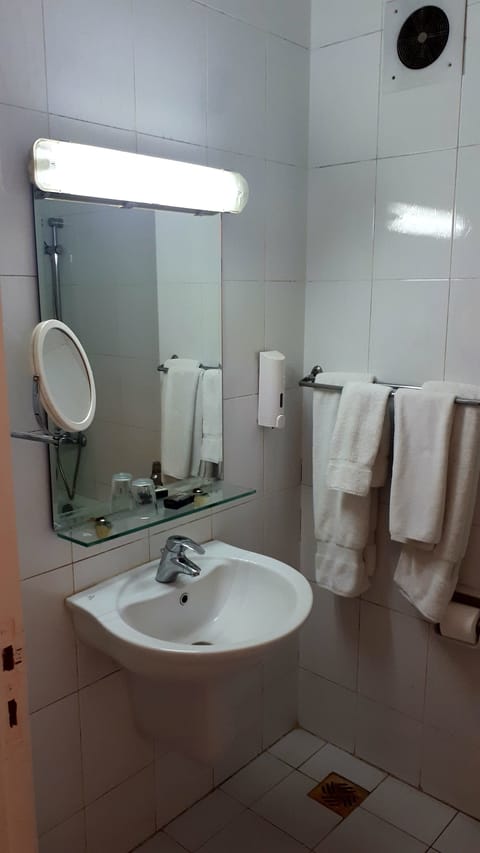 Combined shower/tub, free toiletries, hair dryer, bathrobes