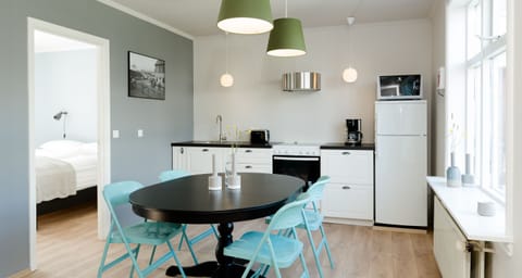 Apartment, 3 Bedrooms, Balcony (Hverfisgata 55) | Private kitchen | Full-size fridge, microwave, oven, stovetop