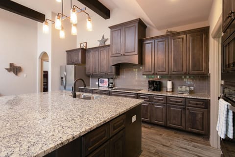 Kitchen has a standard drip coffee pot. We provide the filters, so don't forget your favorite brew!