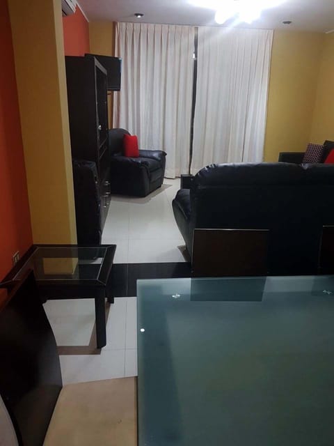 Apartment, 3 Bedrooms | Living room | Flat-screen TV