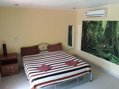 Garden View with A/C | 1 bedroom, pillowtop beds, in-room safe, individually decorated