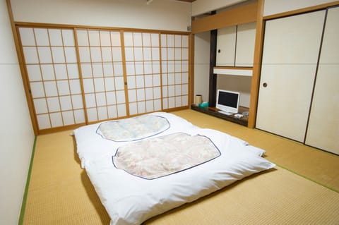 Japanese-Style Room, Shared Bathroom | In-room safe, bed sheets