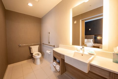 Suite, Multiple Beds | Bathroom | Shower, free toiletries, hair dryer, towels