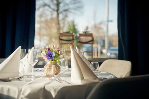 Breakfast, lunch, dinner served; local cuisine 