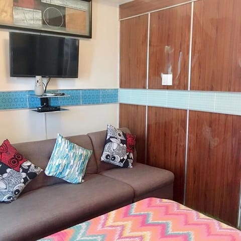 Condo, 1 Bedroom (Maximum 1 Night Stay) | Living room | 40-inch flat-screen TV with cable channels, TV