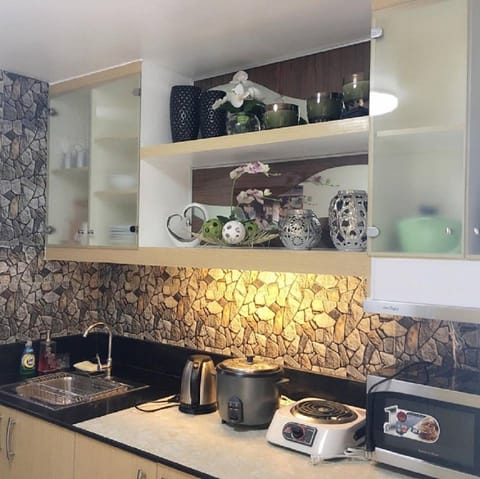 Condo, 1 Bedroom (Maximum 1 Night Stay) | Private kitchen | Full-size fridge, microwave, stovetop, electric kettle