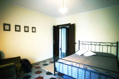 Double Room, Private Bathroom (External Shared Shower) | Desk, iron/ironing board, free WiFi, bed sheets