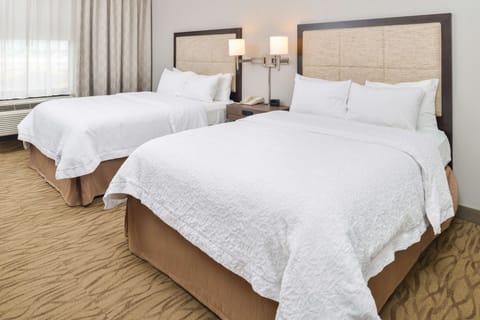 Premium bedding, down comforters, pillowtop beds, blackout drapes