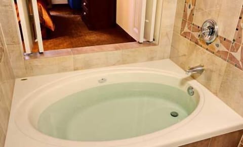Suite, 2 Queen Beds, Non Smoking, Jetted Tub | Deep soaking bathtub