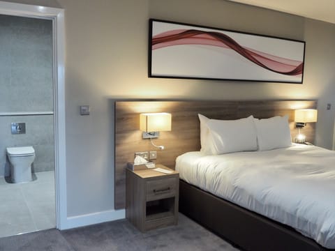 Suite, 1 King Bed, Non Smoking (with 1 Child Sofa Bed) | In-room safe, desk, iron/ironing board, free WiFi