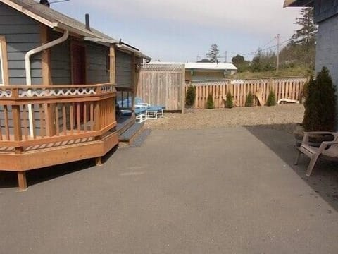 67x100 ft. private parking, with 6 ft security fence & 2 car Carport.