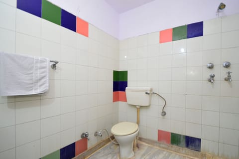 Family Room (Non AC) | Bathroom | Shower, free toiletries, slippers, towels