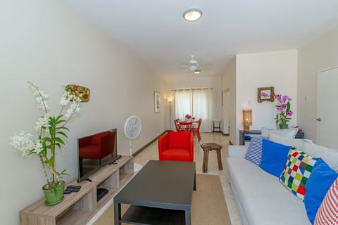 Deluxe Townhome, 2 Bedrooms, Sea View, Poolside | Living room | 42-inch flat-screen TV with cable channels, TV
