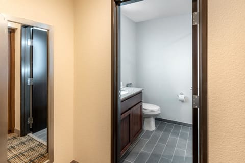 Suite, Multiple Beds, Non Smoking | Bathroom | Designer toiletries, hair dryer, slippers, towels
