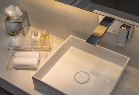 Shower, rainfall showerhead, designer toiletries, hair dryer