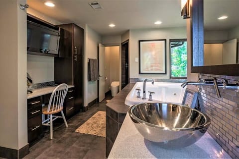 Master bath with TV and heated bidet. Walk in shower and extra large jacuzzi tub