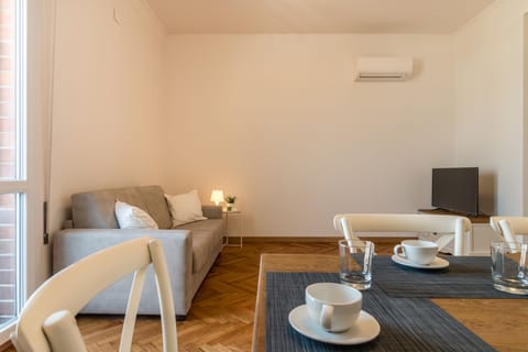 Apartment, 2 Bedrooms | Living room | Flat-screen TV