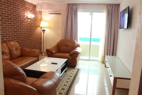 Suite, 1 Bedroom | Living room | 32-inch flat-screen TV with cable channels, TV