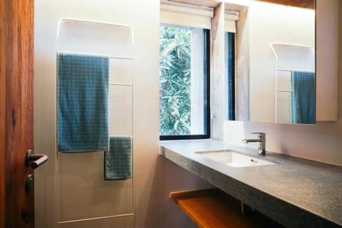 Bathroom | Rainfall showerhead, free toiletries, hair dryer, bathrobes