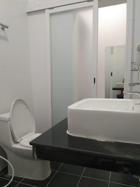 Standard Double Room | Bathroom | Shower, free toiletries, hair dryer, slippers