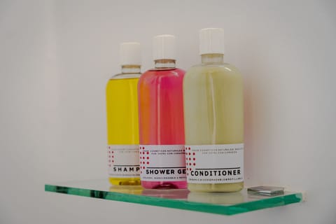 Shower, eco-friendly toiletries, hair dryer, towels