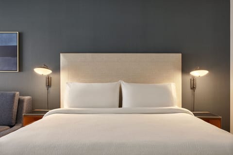 Premium bedding, down comforters, in-room safe, desk