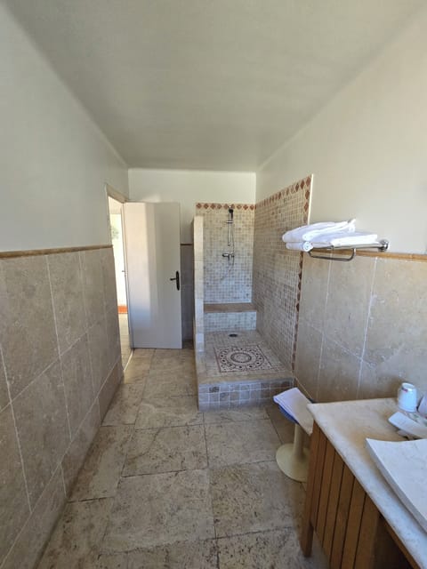 Family Triple Room | Bathroom | Shower, free toiletries, hair dryer, towels