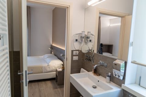 Deluxe Double or Twin Room, Balcony, Garden View | Bathroom | Shower, free toiletries, hair dryer, bidet