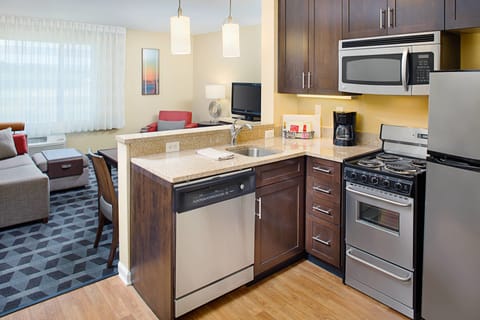 Suite, 2 Bedrooms | Private kitchenette | Full-size fridge, microwave, stovetop, dishwasher
