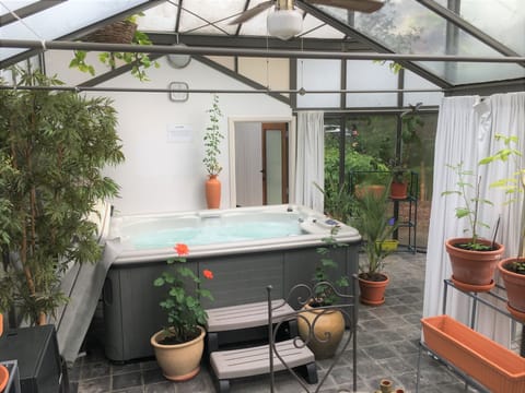 Superior Apartment, Sauna, Garden Area | Private spa tub