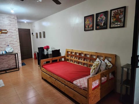 City Condo, 1 Queen Bed with Sofa bed | Living area | Flat-screen TV