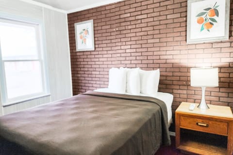 Room, 1 Queen Bed | Desk, iron/ironing board, free WiFi, bed sheets