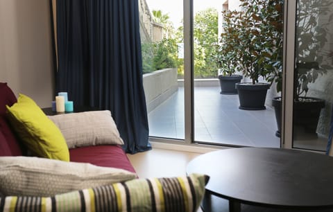 Apartment, 1 Bedroom | Living room | LCD TV