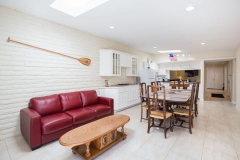 Red Leather Sofa Folds out to Queen