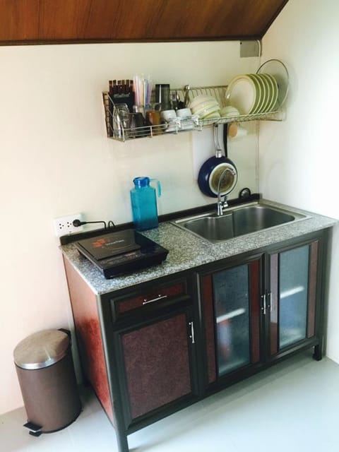 Signature Villa, 1 King Bed | Private kitchenette | Full-size fridge, microwave, stovetop, coffee/tea maker