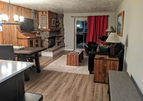 Open floor plan with beautiful view of the trees