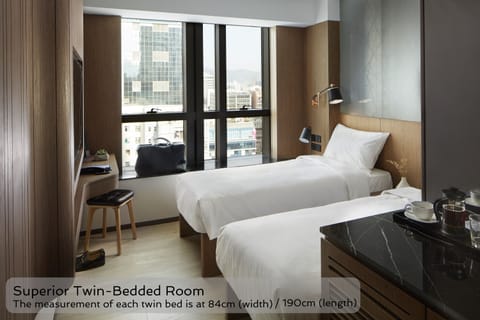 Superior Twin Room | Minibar, in-room safe, soundproofing, iron/ironing board