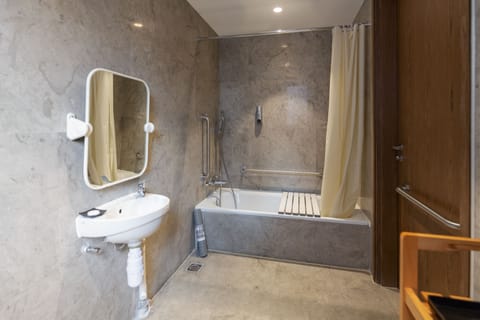 Superior Double Room (Disabled Room) | Bathroom | Shower, hair dryer, slippers, towels