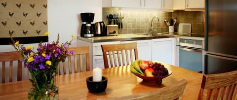 Apartment, 2 Bedrooms | Private kitchen | Full-size fridge, oven, stovetop, dishwasher