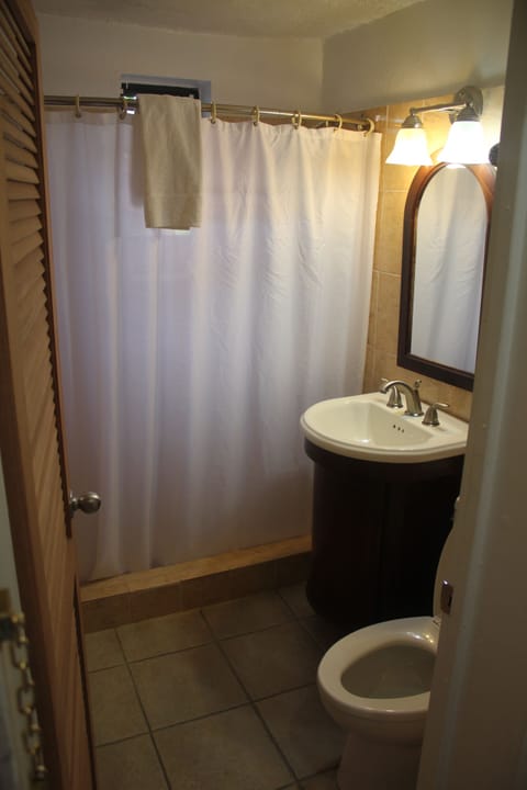 Junior Suite, 1 King Bed, Harbor View | Bathroom | Shower, hair dryer, towels