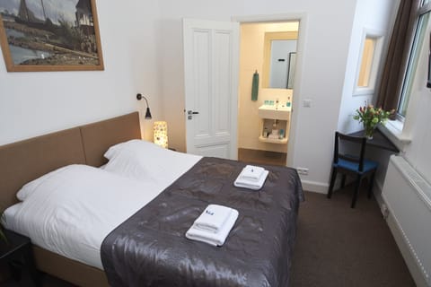 Economy Room, 2 Twin Beds | Blackout drapes, iron/ironing board, free WiFi, bed sheets