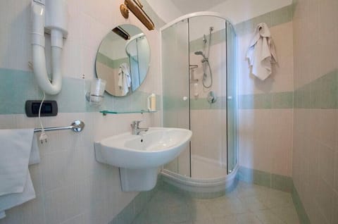 Shower, eco-friendly toiletries, hair dryer, bidet